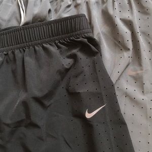 Nike dri fit thin running pants. Size M
